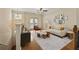 Living room with modern decor, hardwood floors, decor, and lots of natural light at 1536 Liberty Nw Pkwy, Atlanta, GA 30318