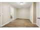 The room has beautiful wood-look floors, neutral walls, and ample space for customization at 1536 Liberty Nw Pkwy, Atlanta, GA 30318