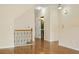 A view of the staircase and half bathroom off the main living area at 1536 Liberty Nw Pkwy, Atlanta, GA 30318