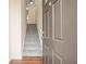 Stairway view from the front door of townhouse leading up to the main level at 1536 Liberty Nw Pkwy, Atlanta, GA 30318
