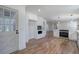 Bright kitchen with stainless appliances, herringbone backsplash, and an open floor plan at 163 Bruce Rd, Douglasville, GA 30134