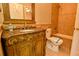 Bathroom with ornate vanity, shower and marble countertop at 4129 Lansfaire Ter, Suwanee, GA 30024