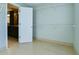 Spacious walk-in closet offering generous storage space with wire shelving and an open doorway at 4129 Lansfaire Ter, Suwanee, GA 30024