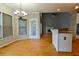 Eat in kitchen with stainless appliances and view of the living room fireplace at 4129 Lansfaire Ter, Suwanee, GA 30024