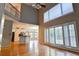 View of living room, kitchen, and breakfast nook with bright light at 4129 Lansfaire Ter, Suwanee, GA 30024