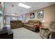 Finished basement with plush seating, a TV, and ample space for relaxation and entertainment at 5292 Candleberry Sw Dr, Lilburn, GA 30047