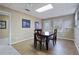 Basement dining area with seating for four, neutral walls, and recessed lighting at 5292 Candleberry Sw Dr, Lilburn, GA 30047