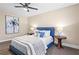 Cozy bedroom features hardwood floors, plush bedding, and modern decor at 5403 Woodberry Cir, Marietta, GA 30068