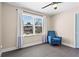 Bedroom with hardwood floors, chair and window at 5403 Woodberry Cir, Marietta, GA 30068