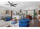 Bright open-concept living space with kitchen featuring modern finishes and a seamless flow to the dining and living area at 5403 Woodberry Cir, Marietta, GA 30068