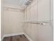Empty walk-in closet ready for personal storage with shelving at 5403 Woodberry Cir, Marietta, GA 30068