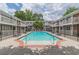 Beautiful community pool with lounge chairs at 885 Briarcliff Ne Rd # D3, Atlanta, GA 30306