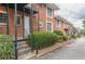 Brick exterior showcasing well-maintained landscaping and charming curb appeal at 885 Briarcliff Ne Rd # D3, Atlanta, GA 30306