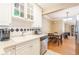 Functional kitchen with white cabinets, modern appliances, and open access to the dining area at 885 Briarcliff Ne Rd # D3, Atlanta, GA 30306