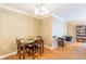 Bright open living area with hardwood floors, a bookcase, and natural light at 885 Briarcliff Ne Rd # D3, Atlanta, GA 30306