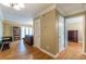 View of the open-concept living area featuring hardwood flooring and seamless access to the bedroom at 885 Briarcliff Ne Rd # D3, Atlanta, GA 30306