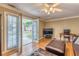 Cozy living room featuring hardwood floors and French doors to outdoor patio at 885 Briarcliff Ne Rd # D3, Atlanta, GA 30306