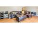 Spacious living room with hardwood floors, leather furniture, and ample seating at 885 Briarcliff Ne Rd # D3, Atlanta, GA 30306