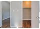 View of a closet with wood-look floors and a light at 2102 Lenoa Ln, Austell, GA 30106