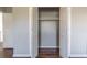 Spacious closet with louvered doors and a clothes rack at 2102 Lenoa Ln, Austell, GA 30106