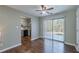 A view of the dining room with wood floors, access to the kitchen and sliding doors to the patio at 2102 Lenoa Ln, Austell, GA 30106