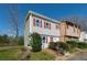 A view of the home's exterior featuring siding, red shutters and a well-manicured lawn at 2102 Lenoa Ln, Austell, GA 30106