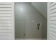 A view of the home's laundry room featuring white walls and washer and dryer hookups at 2102 Lenoa Ln, Austell, GA 30106