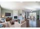 Open concept living room with fireplace and hardwood floors at 2102 Lenoa Ln, Austell, GA 30106