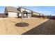 Spacious backyard with a gazebo seating area and a fire pit, great for outdoor entertaining at 2286 Cadenza Cir, Dacula, GA 30019
