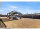 Large backyard featuring a gazebo with an outdoor seating area and views of the landscape at 2286 Cadenza Cir, Dacula, GA 30019