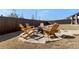 Backyard patio featuring a fire pit with Adirondack chairs for outdoor entertaining at 2286 Cadenza Cir, Dacula, GA 30019
