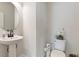 Half bath with pedestal sink at 2286 Cadenza Cir, Dacula, GA 30019