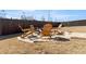 Backyard fire pit area is a great place for relaxation and social gathering with Adirondack chairs at 2286 Cadenza Cir, Dacula, GA 30019