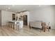 Open-concept kitchen features a large island with seating and stainless steel appliances at 2286 Cadenza Cir, Dacula, GA 30019