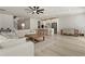 Bright open-concept living space with a modern kitchen, dining area, and comfortable seating at 2286 Cadenza Cir, Dacula, GA 30019