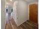 Welcoming entrance hallway with wood-style flooring and ample closet space at 560 Dutch Valley Ne Rd # 2301, Atlanta, GA 30324