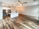 Spacious living area featuring modern lighting, stainless appliances, and an open layout at 560 Dutch Valley Ne Rd # 2301, Atlanta, GA 30324