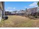 A spacious backyard with lush grass and a privacy fence at 11643 Sarah Loop, Hampton, GA 30228
