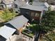 Aerial view of the property featuring a modern backyard with patio, lawn and outdoor seating at 1742 Ridgeway Nw Ave, Atlanta, GA 30318