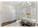 Modern bathroom with glass shower, subway tile, and stylish vanity with chrome fixtures at 1742 Ridgeway Nw Ave, Atlanta, GA 30318