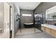 Modern bathroom features a freestanding tub, glass shower, and sleek vanity at 1742 Ridgeway Nw Ave, Atlanta, GA 30318