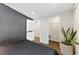 Modern bedroom with dark accent wall, sleek lighting, and closet at 1742 Ridgeway Nw Ave, Atlanta, GA 30318