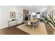 Spacious dining room with a rustic fireplace, and an open layout, great for hosting gatherings and creating memories at 1742 Ridgeway Nw Ave, Atlanta, GA 30318