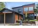 Contemporary exterior with mixed materials, including siding and wood accents, with a picnic table in the backyard at 1742 Ridgeway Nw Ave, Atlanta, GA 30318