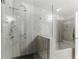 Large glass shower with a shower head and a built-in bench at 1742 Ridgeway Nw Ave, Atlanta, GA 30318