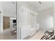Bright walk-in closet with built-in shelving and drawers at 1742 Ridgeway Nw Ave, Atlanta, GA 30318