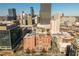 Amazing aerial view showcasing the brick Kessler City Lofts in downtown Atlanta with the skyline in the background at 87 Peachtree Sw St # 204, Atlanta, GA 30303