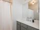 Bright bathroom featuring a shower and modern sink with mirror at 87 Peachtree Sw St # 204, Atlanta, GA 30303