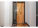 Apartment 204 entry featuring wood door, metal frame, and beautiful wood floors at 87 Peachtree Sw St # 204, Atlanta, GA 30303