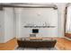 Comfortable living room with modern decor, exposed brick accents, and hardwood floors at 87 Peachtree Sw St # 204, Atlanta, GA 30303